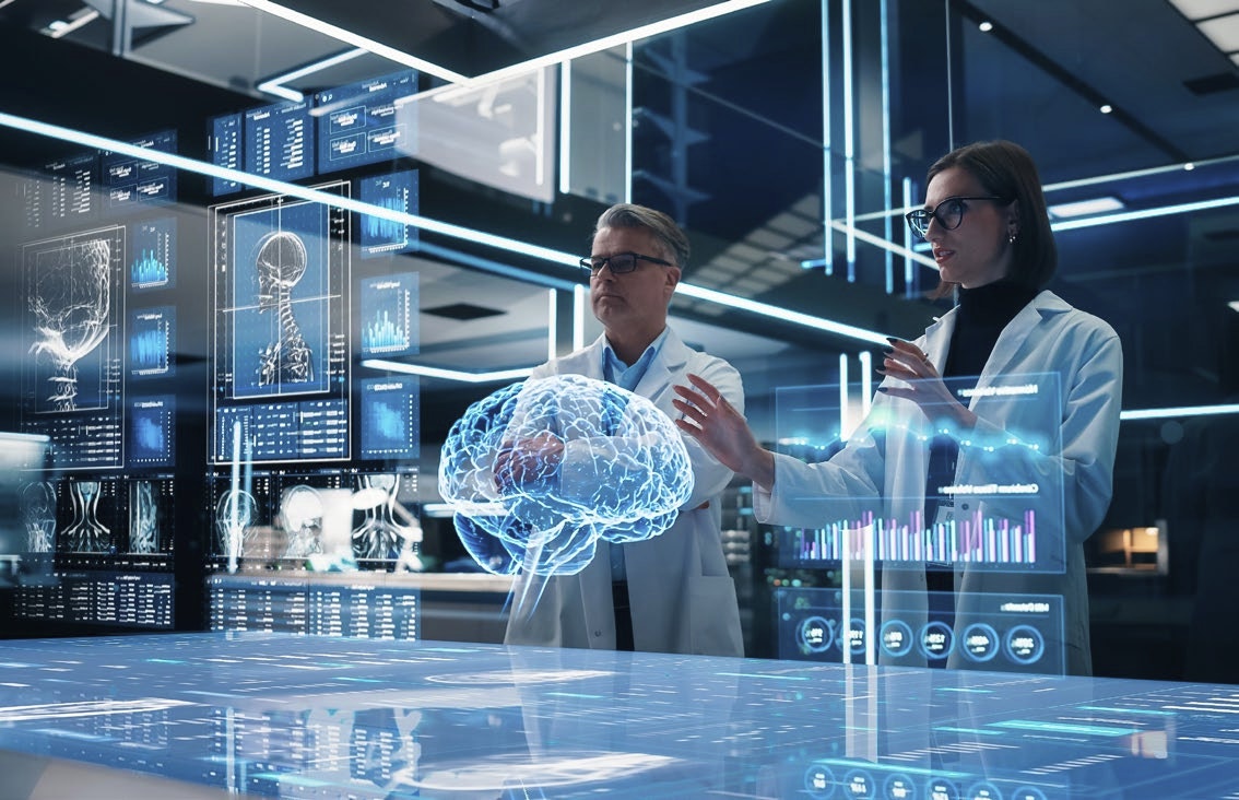 Two scientists in a laboratory inspecting data models