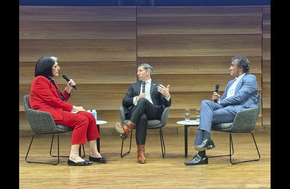Washington AI Network's Tammy Haddan, Noble Reach's Arun Gupta and Office of Personnel Management's Scott Kupor speak during a live podcast recording on Jan. 14 in Washington, D.C.