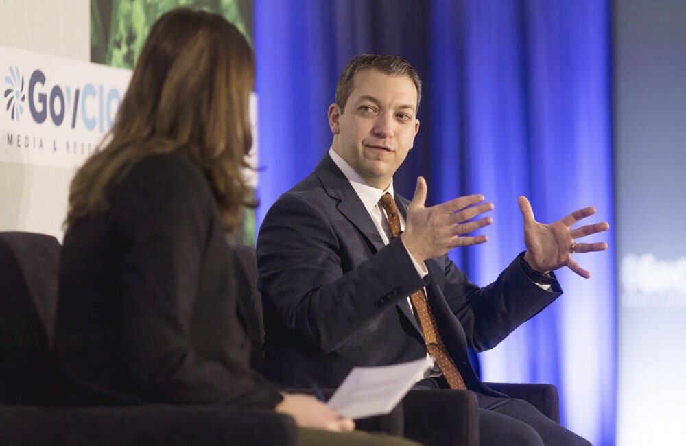 War Department Deputy Assistant Secretary for Science and Technology Foundations Jacob Glassman speaks at GovCIO Media & Research’s Defense IT Summit in Arlington, Virginia, on Feb. 26, 2026.