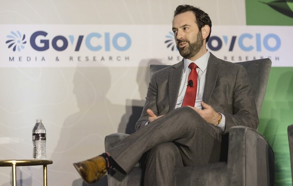 Louis Koplin, acting program executive officer for Digital and Enterprise Services at the Department of the Navy, speaks at GovCIO Media & Research's Defense IT Summit on Feb. 27, 2025, in Arlington, Virginia.