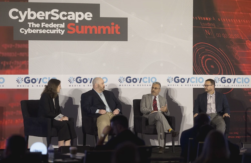 CMS' Keith Busby, DOT's Anil Chaudhry and Wiz's Chris Saunders speak at GovCIO Media & Research's CyberScape: the Federal Cybersecurity Summit on April 16, 2026, in Arlington, Virginia.