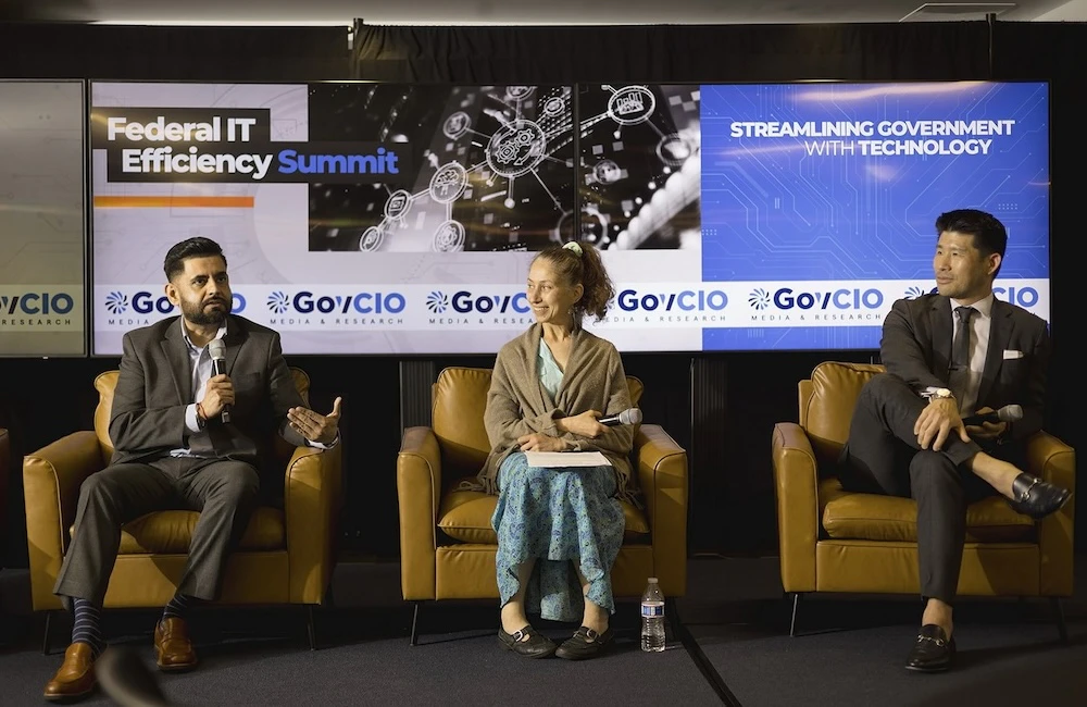 Hemant Baidwan, CISO at Knox Systems; Anna Libkhen, acting CISO at the Bureau of Economic Analysis; and Eric Shen, inspector in charge of the Criminal Investigations Group at U.S. Postal Inspection Service, discuss AI as an efficiency multiplier for federal agencies at GovCIO Media & Research's Federal IT Efficiency Summit on May 20, 2026, in Reston, Virginia.