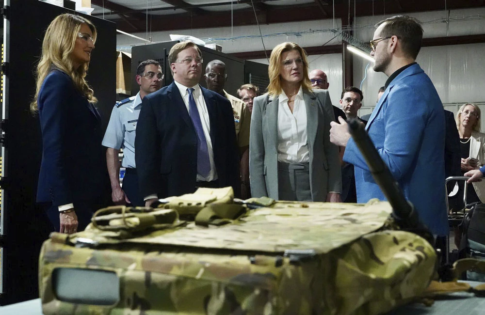Small Business Administration Administrator Kelly Loeffler, Under Secretary of War for Acquisition and Sustainment Michael Duffey and DOW CIO Kirsten Davies listen to Kform CEO Callye Keen during a factory tour of Kform in Sterling, Virginia, on July 16, 2026.