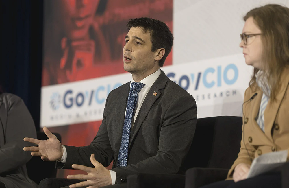 Carter Farmer speaking at a GovCIO Media and Research Summit