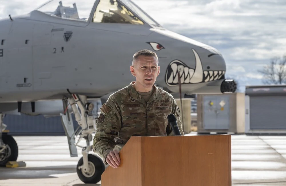 Brig. Gen. Timothy Helfrich, portfolio acquisition axecutive for Fighters and Advanced Aircraft at the Air Force Life Cycle Management Center, Air Force Materiel Command, speaks at the “Hawg Out” ceremony Feb. 12, 2026, at Hill Air Force Base, Utah.