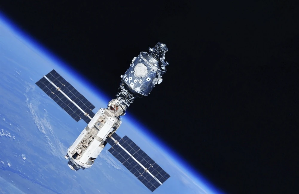 A space satellite above the Earth's surface. Elements of this image furnished by NASA. High quality photo