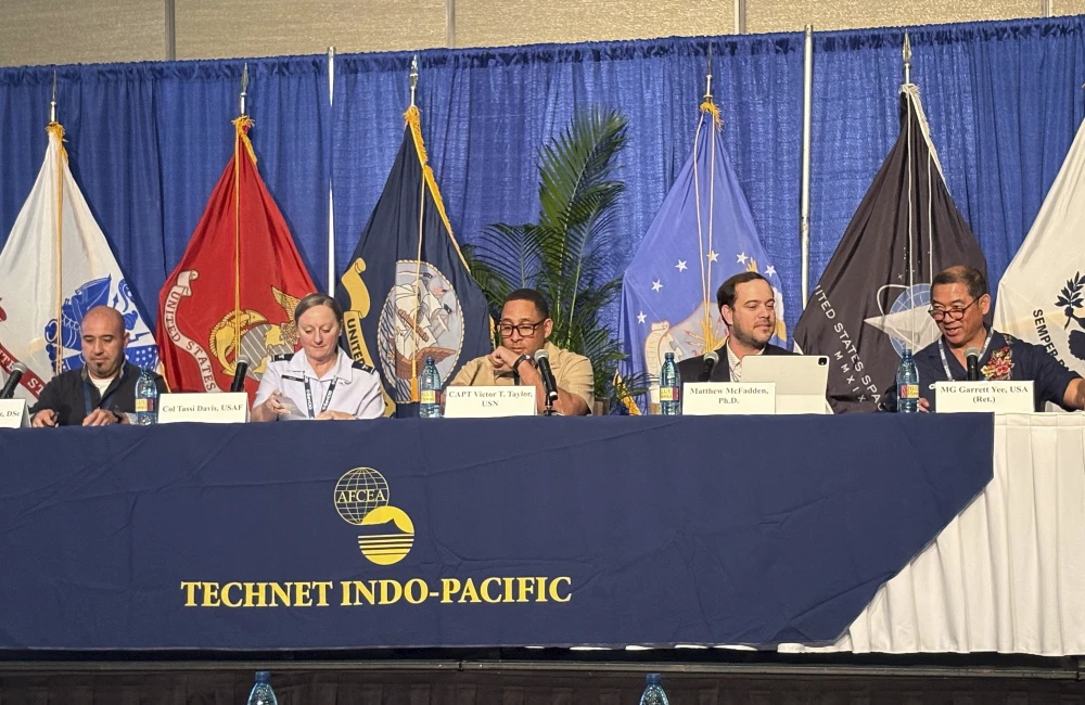From left, Michael Martinez, U.S. Army of the Pacific CISO; Col. Tassi Davis, Pacific Air Forces director of cyber ops and warfighter comms; Capt. Victor T. Taylor, U.S. Pacific Fleet communications and information systems director for the N6 Directorate; Matthew McFadden, General Dynamics Information Technology vice president of cyber and division chief information security officer; and Maj. Gen. Garrett Yee, former assistant to the DISA Director and current GDIT vice president of DOD customer relations, appear at the TechNet Indo-Pacific conference on Oct. 28, 2026, in Honolulu, Hawaii.