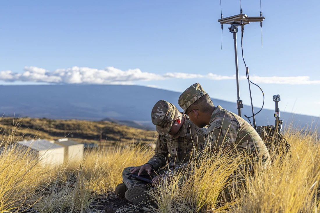 soldiers operate electronics outside